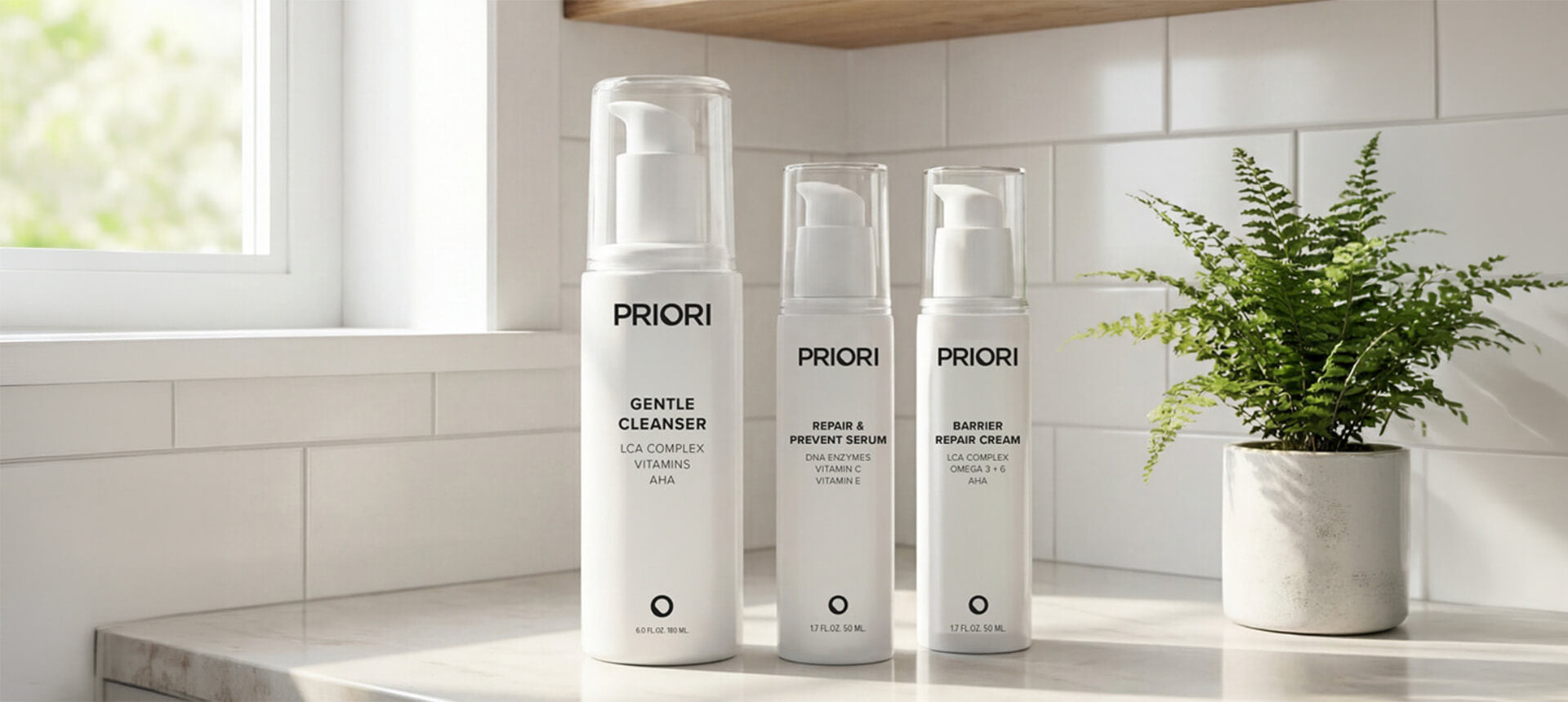 PRIORI 3-Step Skin Reset Bundle white bottles on a marble countertop to cleanse, repair, and moisturize unbalanced skin on your face.