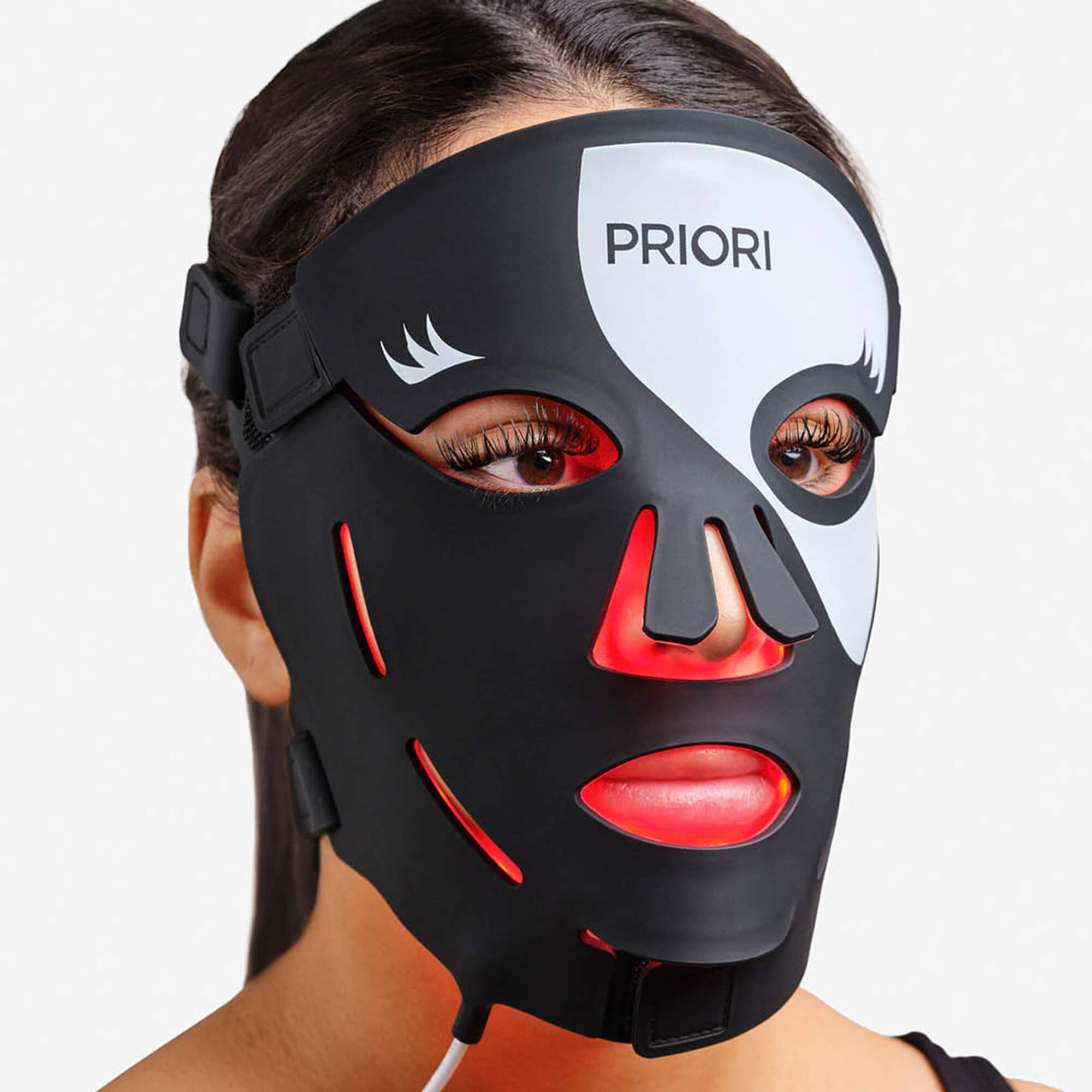 PRIORI Unveiled Red Light LED Face Mask in Black and White closeup on model.