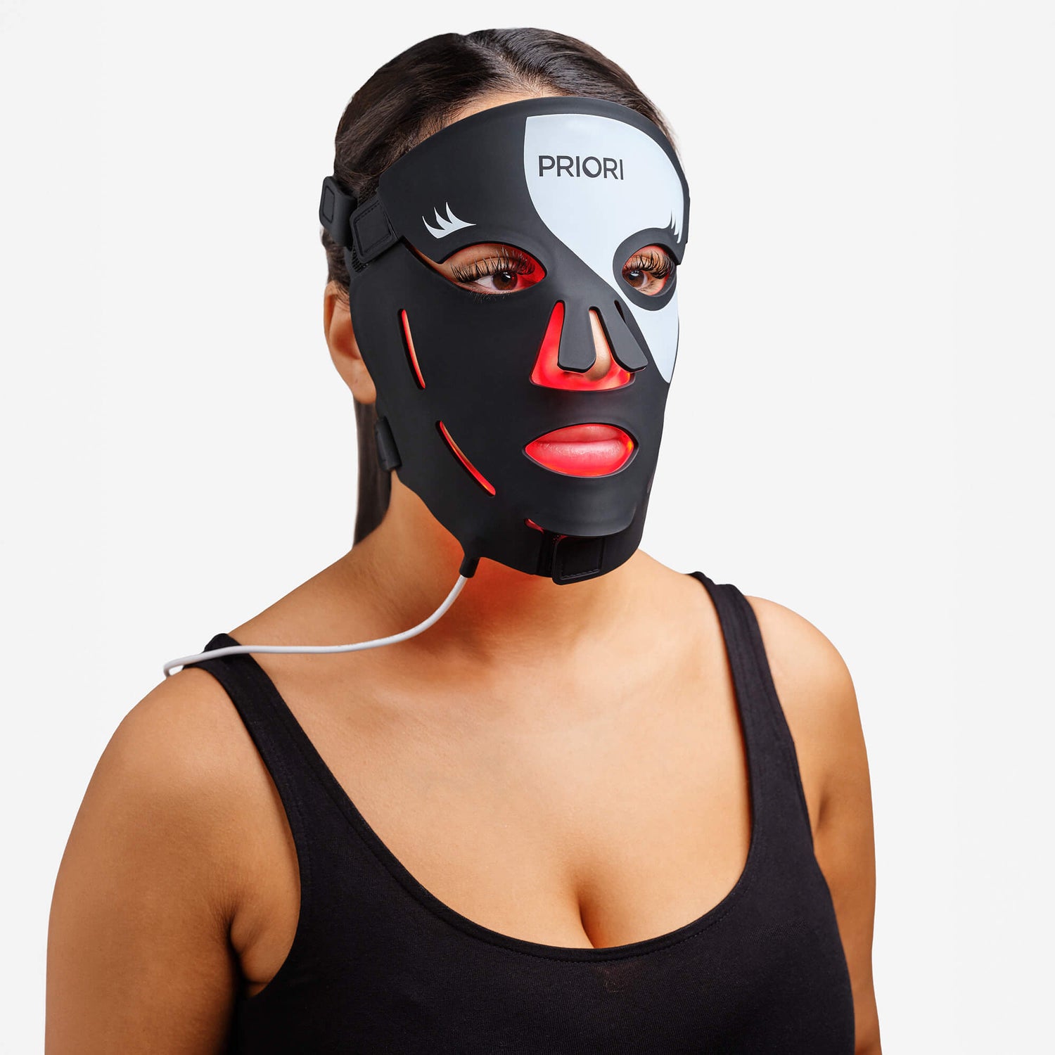 PRIORI Unveiled Red Light LED Face Mask in Black and White on model