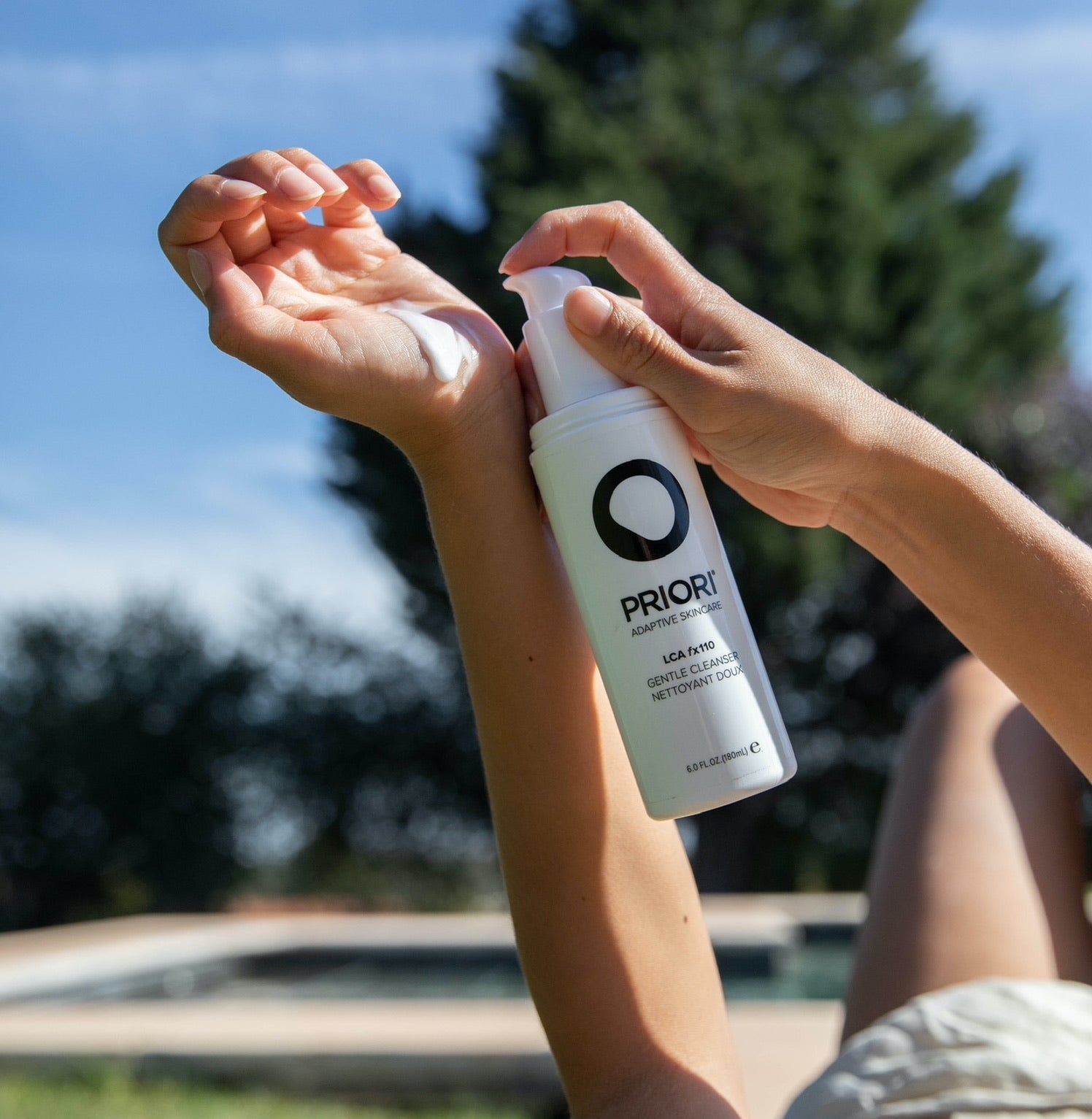 PRIORI LCA Daily Gentle Facial Cleanser pumped into hand to show texture