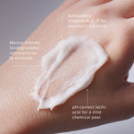 PRIORI fx160 2xFoliant Exfoliating Facial Peel and Shower Scrub Product Features and Microdermabrasion shown on model hand