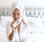 PRIORI LCA Daily Gentle Facial Cleanser with model in a professional skincare spa