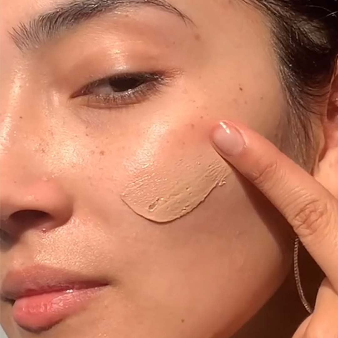 Priori Skincare Tetra Tinted Mineral Sunscreen Lotion Broad Spectrum SPF 55 close up face application